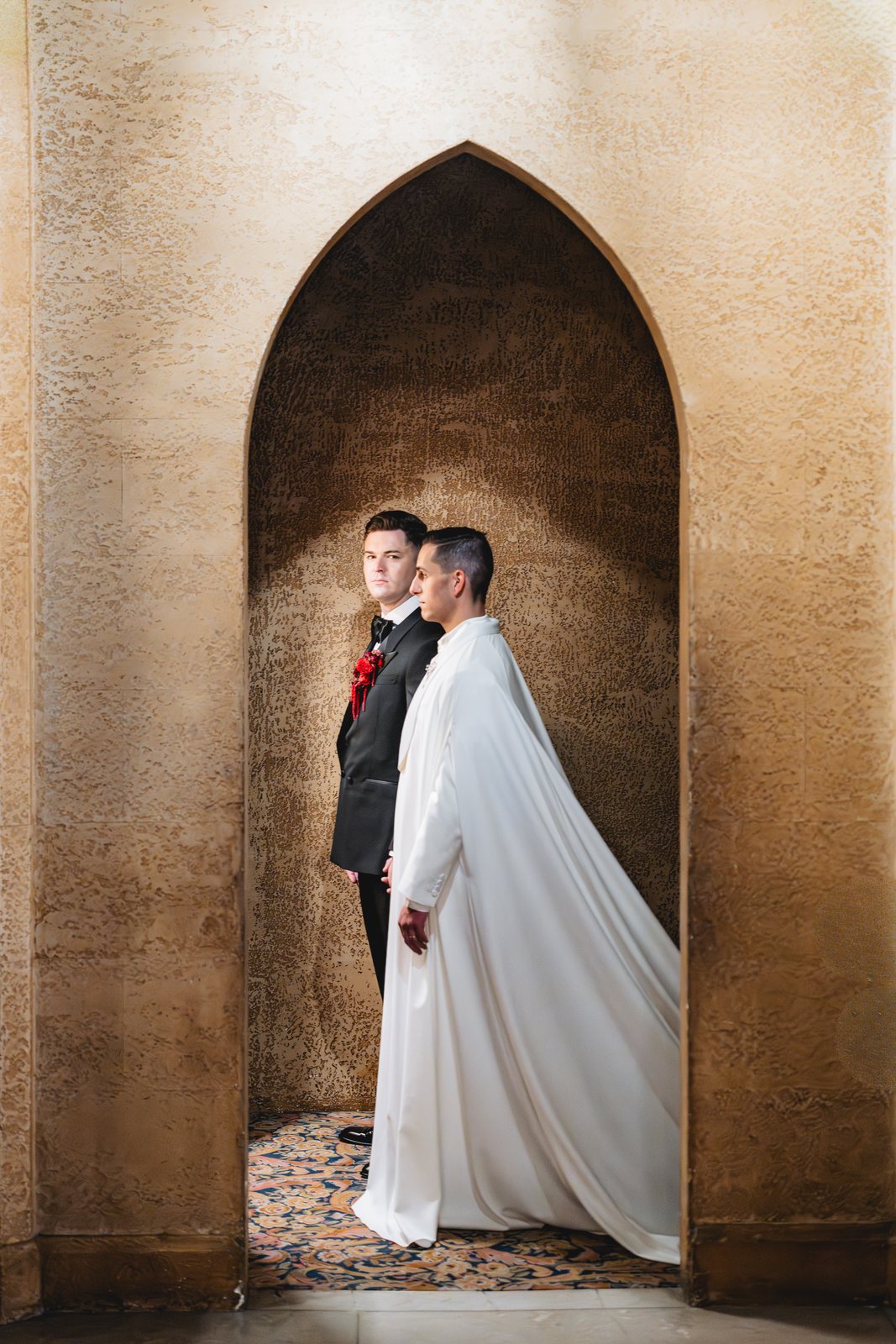 Two grooms in Moorish arch — editorial wedding photography by C2 Films Melbourne