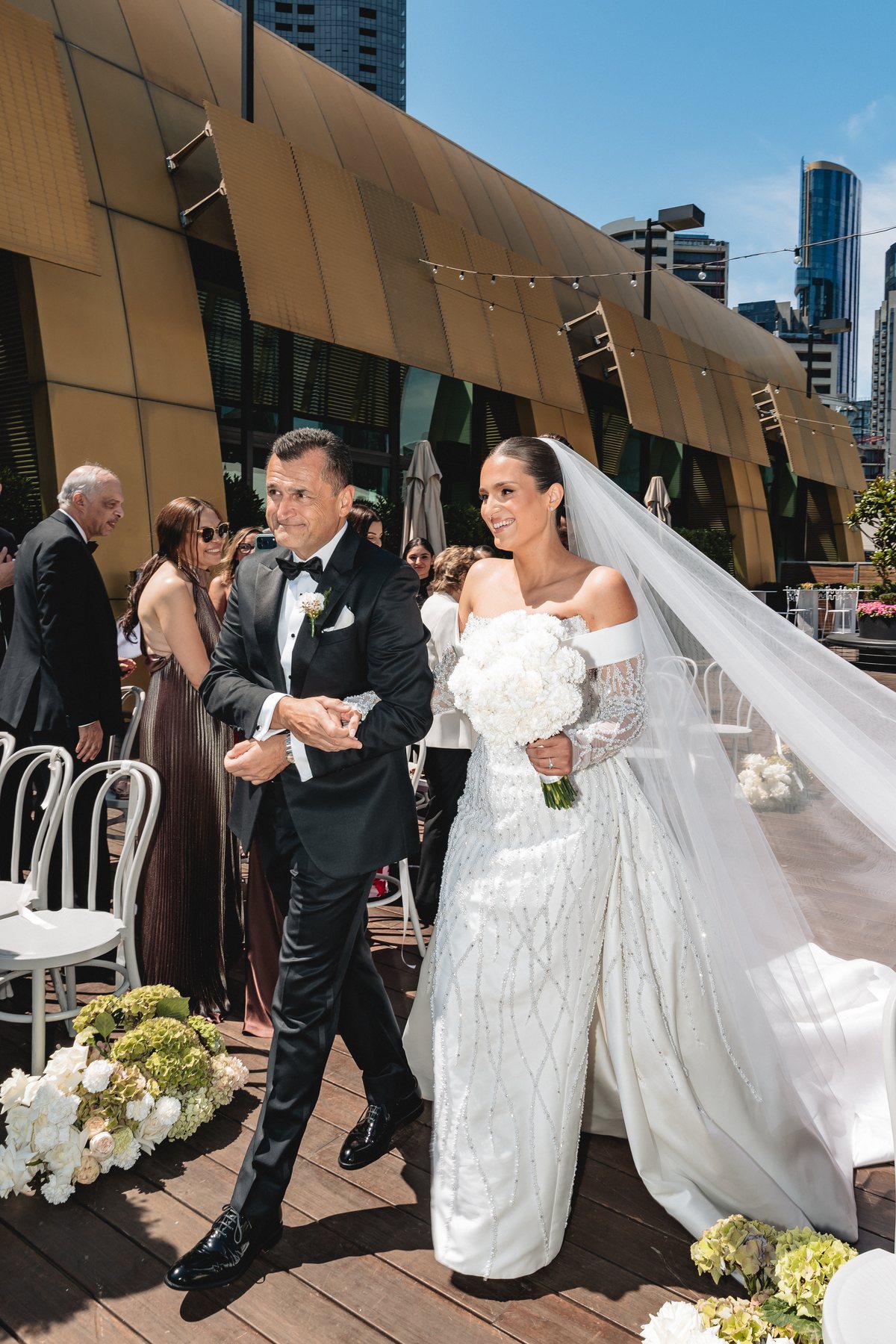 Crown Melbourne wedding — the aisle at Crown Aviary, by C2 Films
