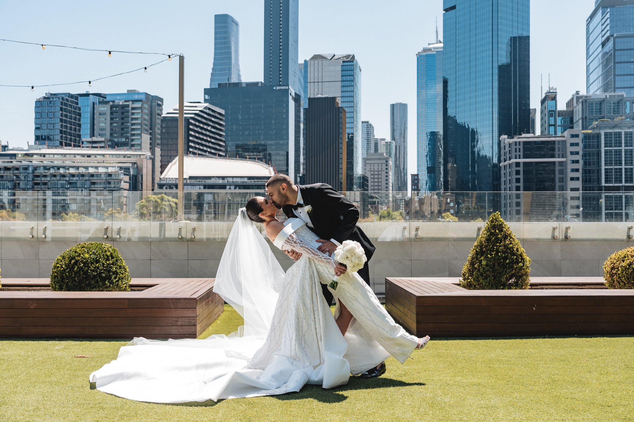 Crown Melbourne wedding — rooftop ceremony at Crown Aviary above the Southbank skyline, photographed by C2 Films