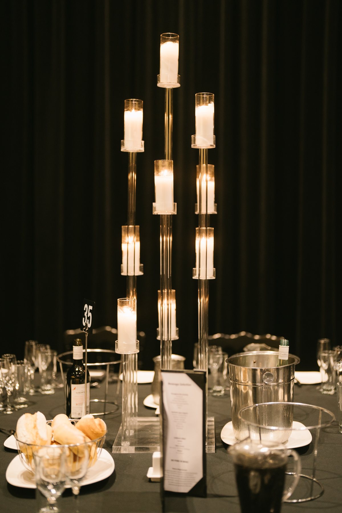 Lakeside Receptions wedding — candelabra centrepiece detail at Lakeside Receptions, by C2 Films