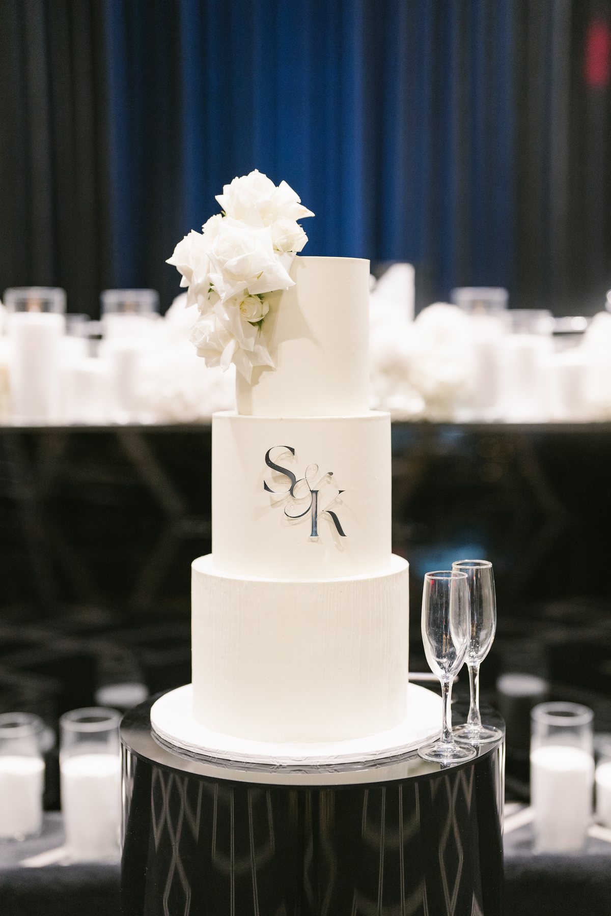 Lakeside Receptions wedding — the wedding cake in the Lakeview Ballroom, by C2 Films