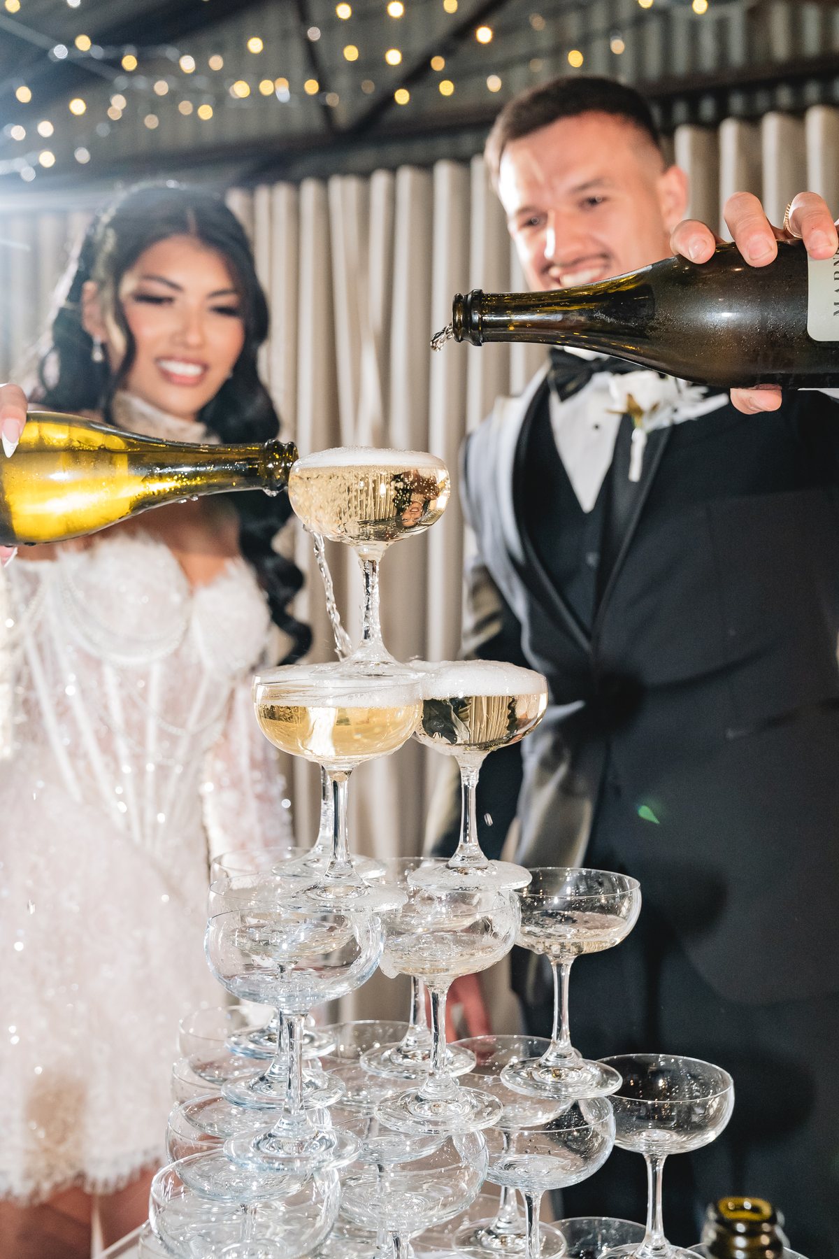 Marnong Estate wedding — champagne tower at the reception, by C2 Films