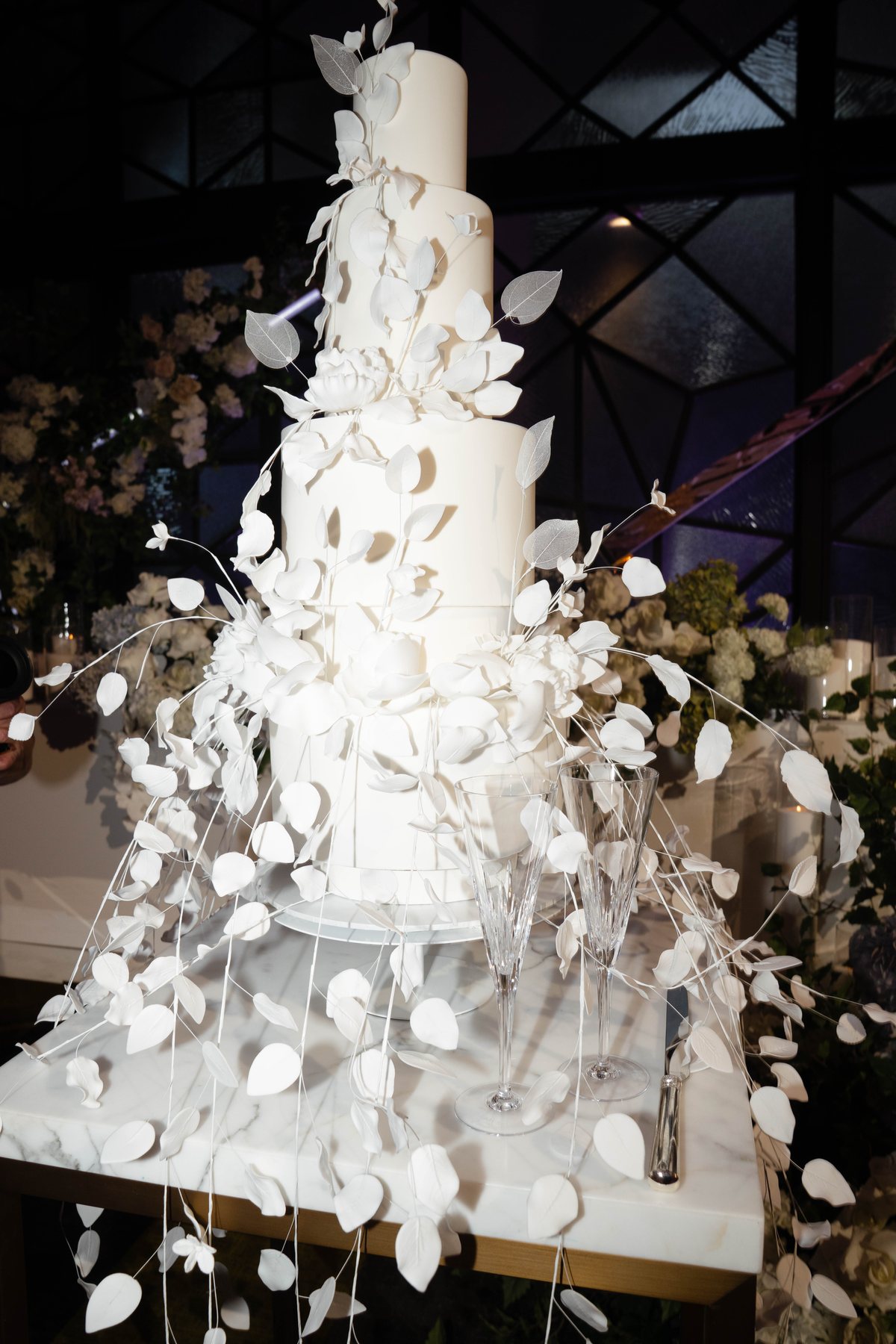 Ritz-Carlton Melbourne wedding — sculptural wedding cake in the Grand Ballroom, by C2 Films