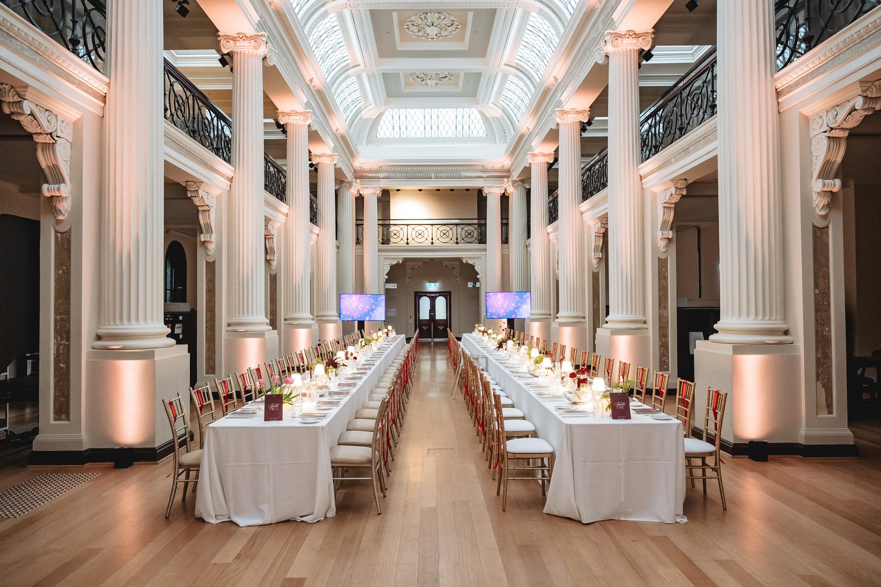 State Library Victoria wedding — Queen's Hall set for a wedding reception, by C2 Films