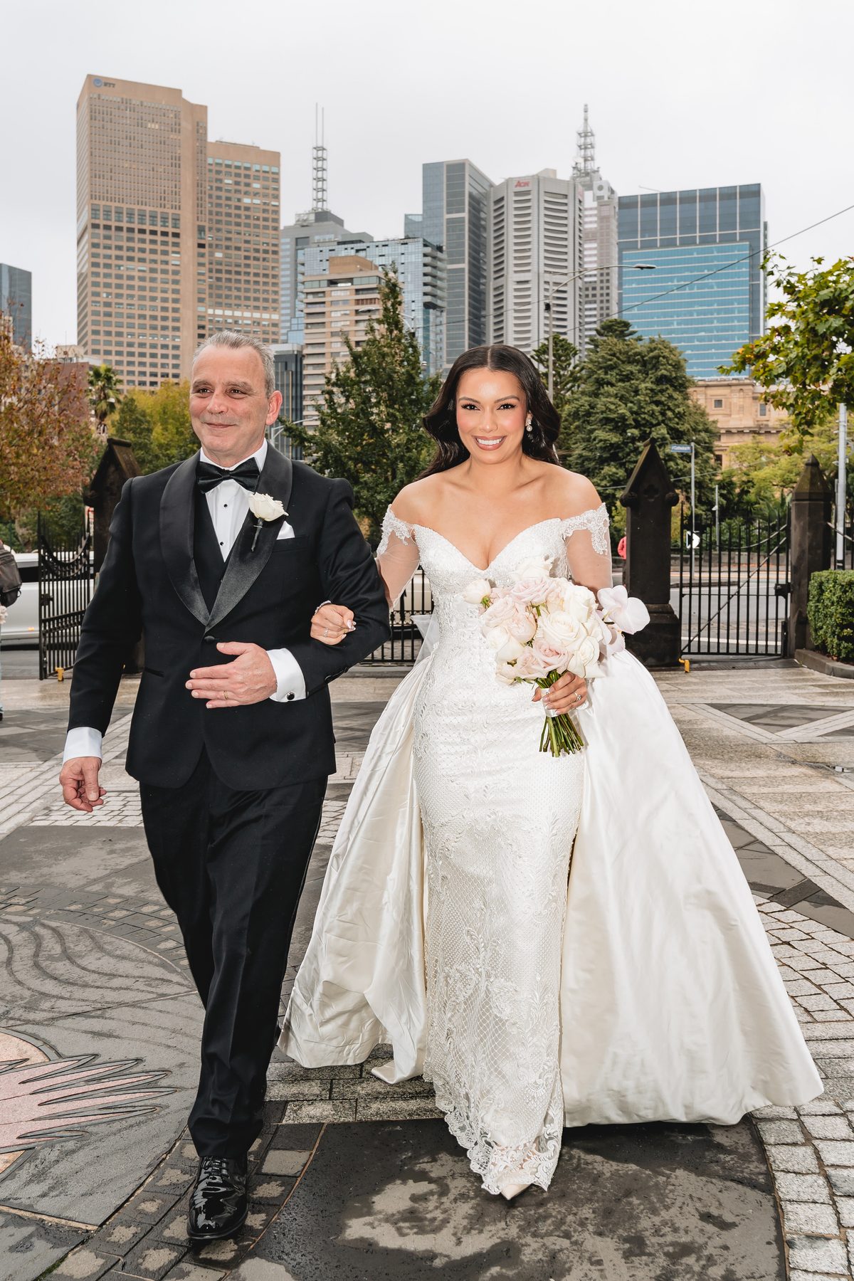 Jack and Natasha walking down the aisle at St Patrick's Cathedral, Melbourne — C2 Films wedding photography