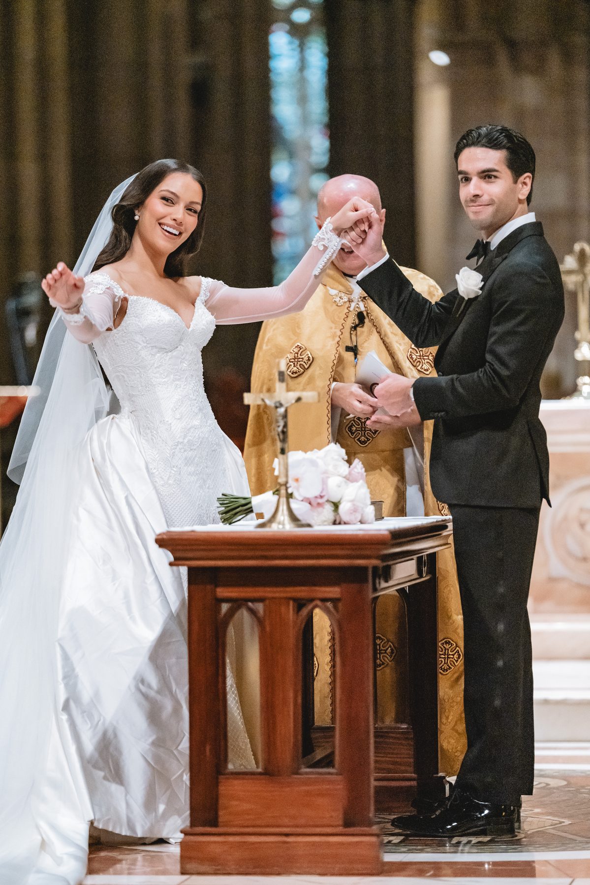 Jack and Natasha during the ceremony at St Patrick's Cathedral, Melbourne — C2 Films wedding photography