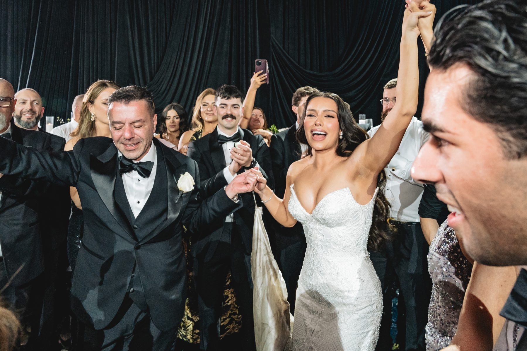 Jack and Natasha — celebrating at the reception at W Melbourne, Melbourne wedding photography by C2 Films