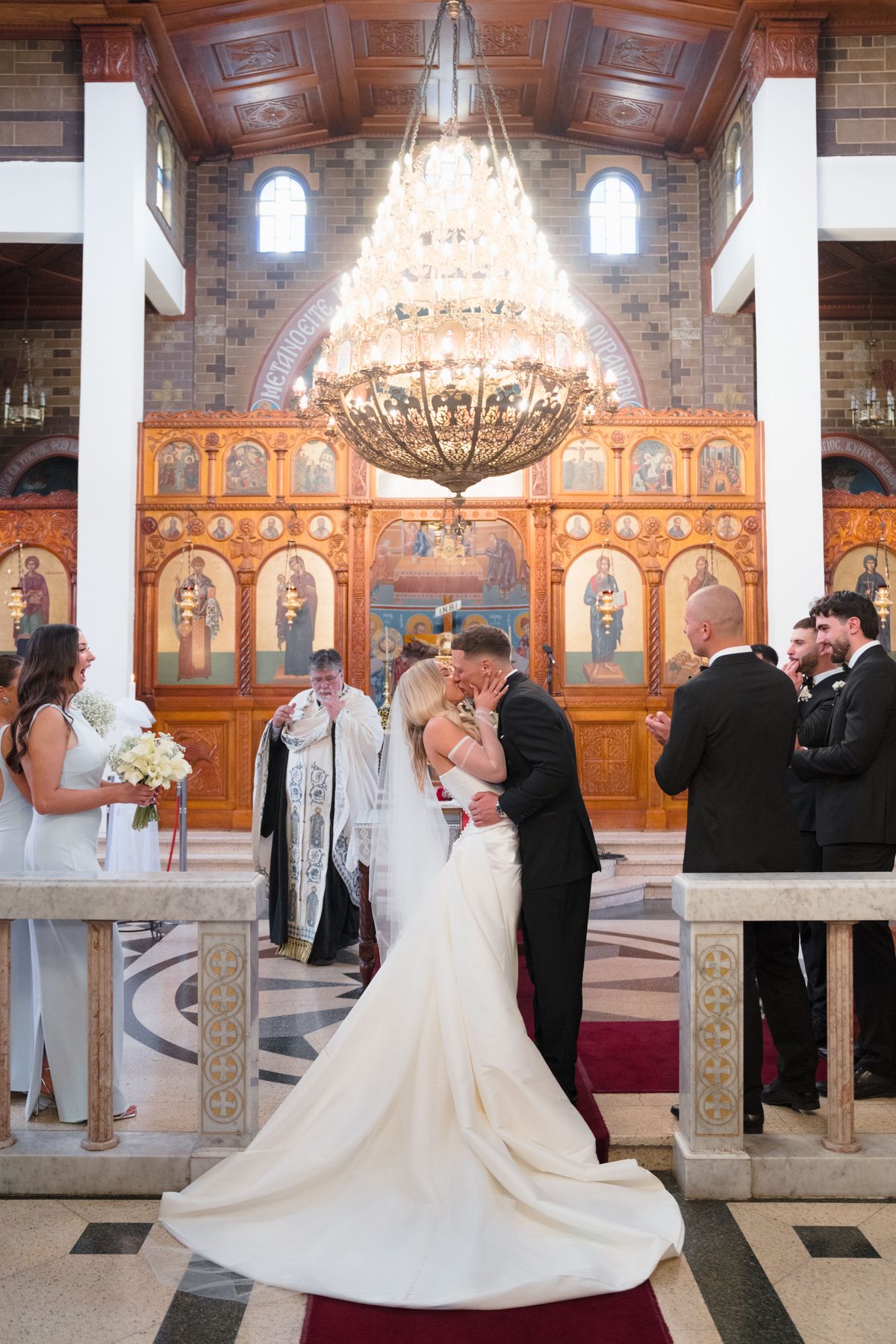 Jacob and Olivia after the ceremony at St John the Forerunner Greek Orthodox Church, Carlton — C2 Films wedding photography