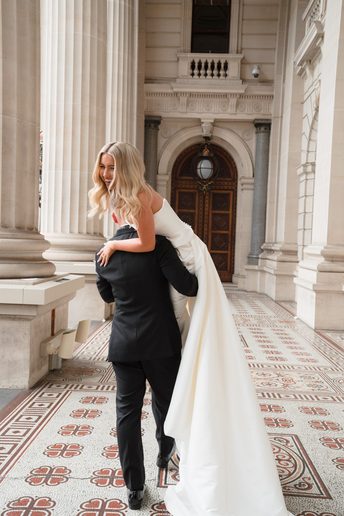 Jacob and Olivia — bridal party portraits on their wedding day at The George Ballroom, St Kilda, by C2 Films