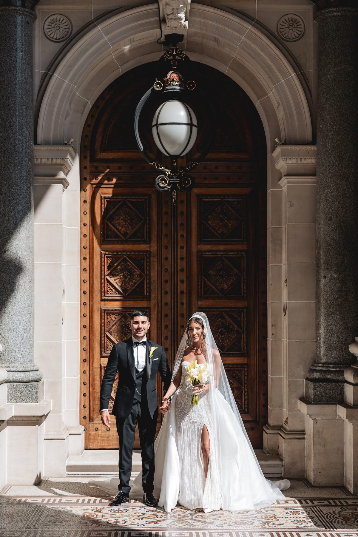 Jean-Claude and Elena walking down the aisle at St Nicholas Greek Orthodox Church — C2 Films wedding photography