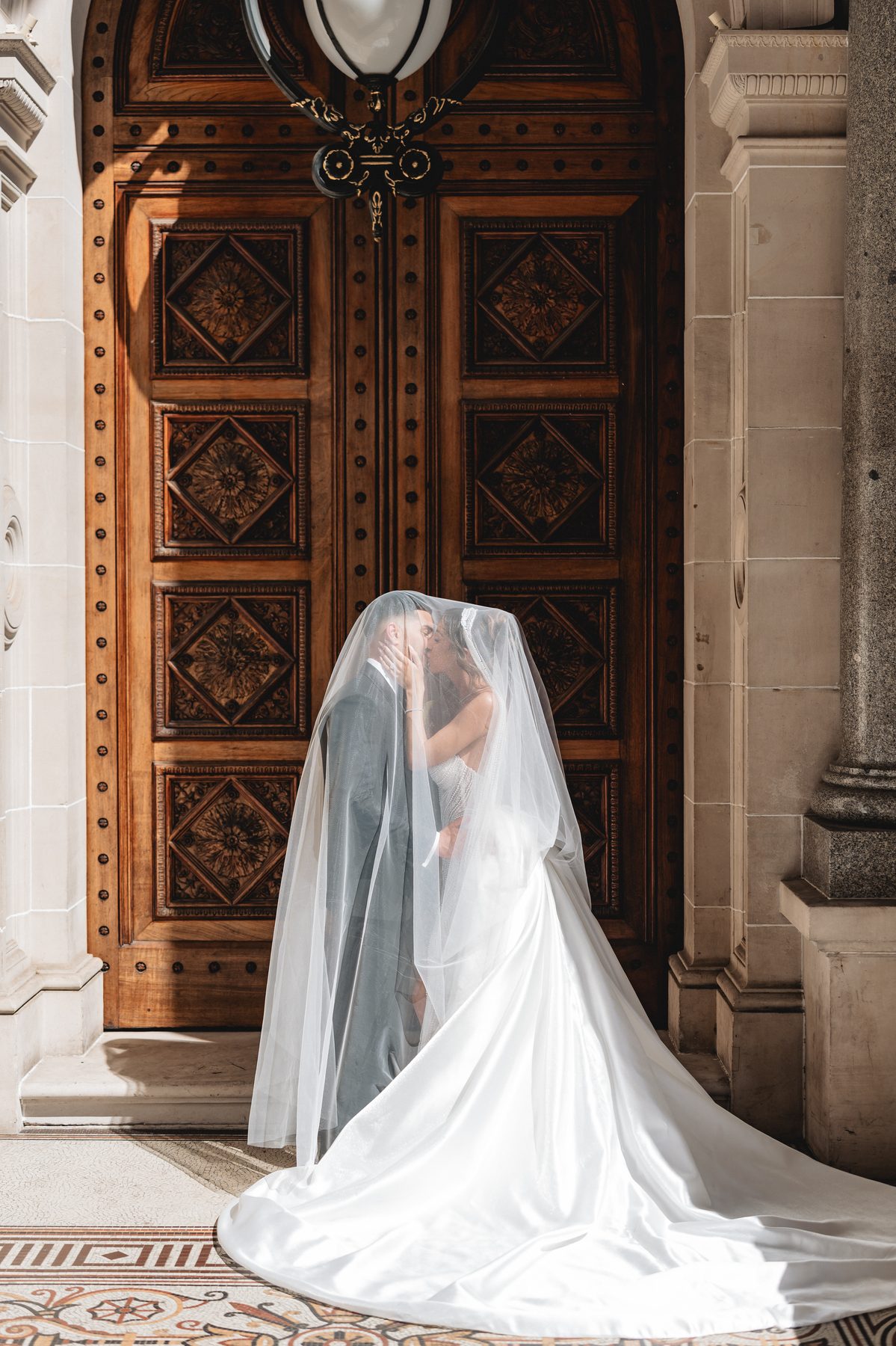 Jean-Claude and Elena during the ceremony at St Nicholas Greek Orthodox Church — C2 Films wedding photography