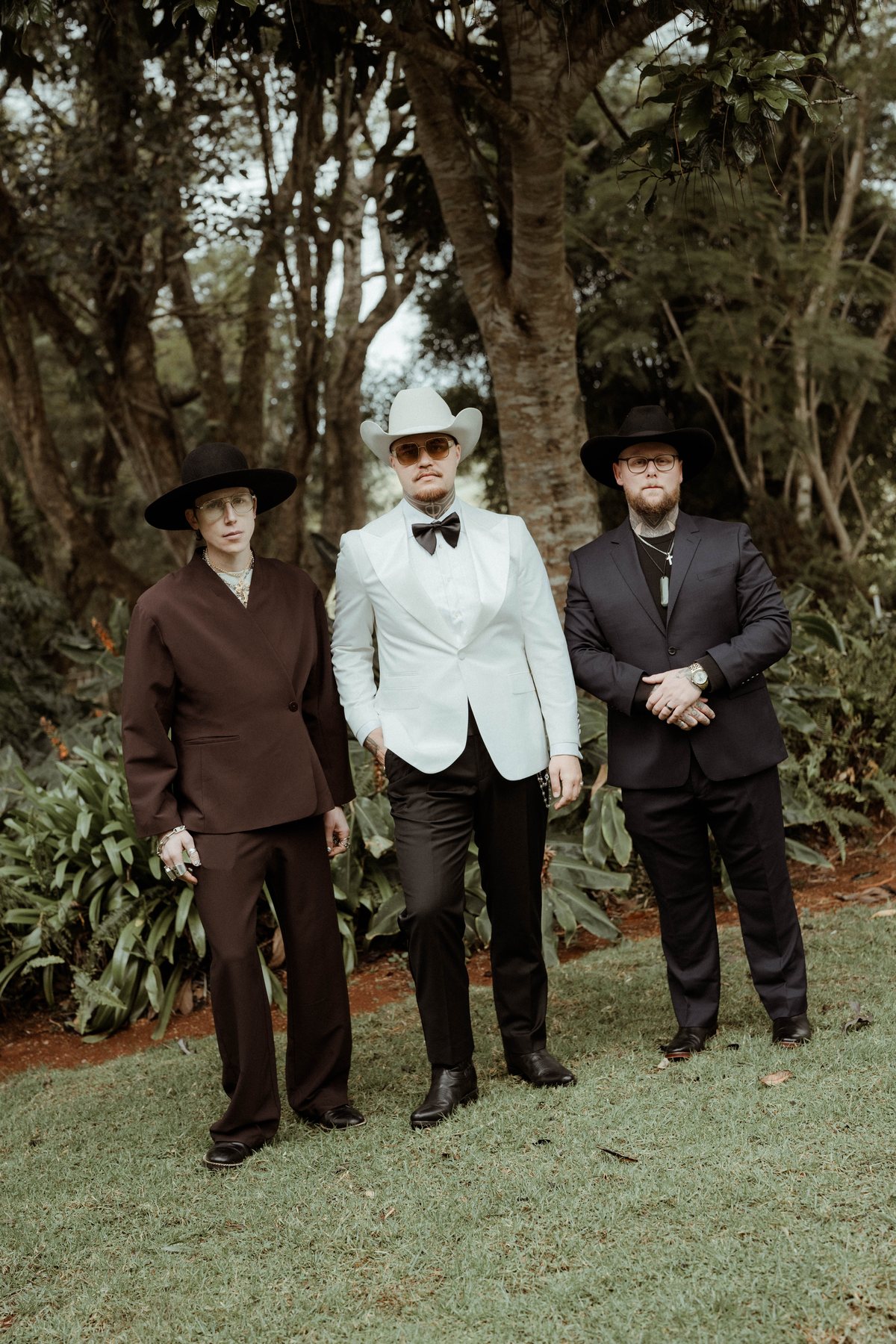 Kaleb with his groomsmen in white and black tailoring at Rosewood Estate, Beechmont QLD — wedding photography by C2 Films