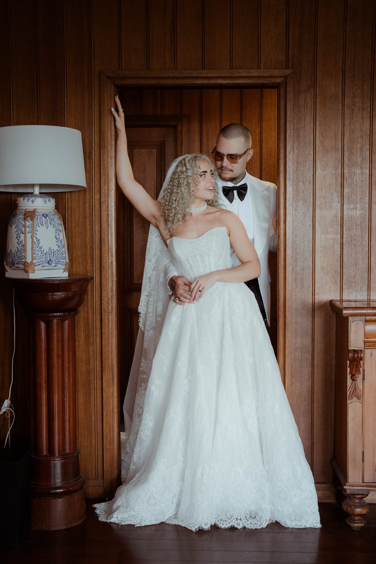 Kaleb and Monique together in the wood-panelled interior at Rosewood Estate, Beechmont QLD — wedding photography by C2 Films