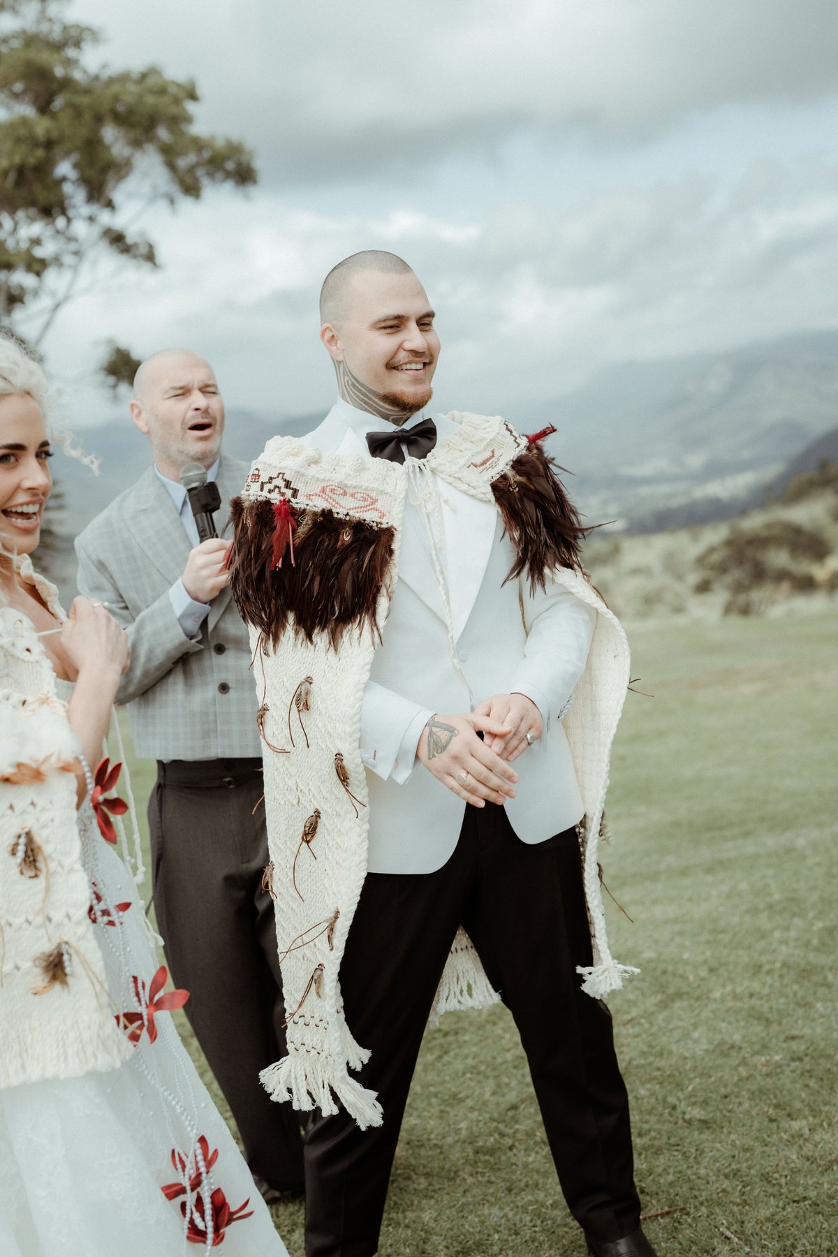 The celebrant with Kaleb and Monique during the ceremony at Rosewood Estate, Beechmont QLD — wedding photography by C2 Films