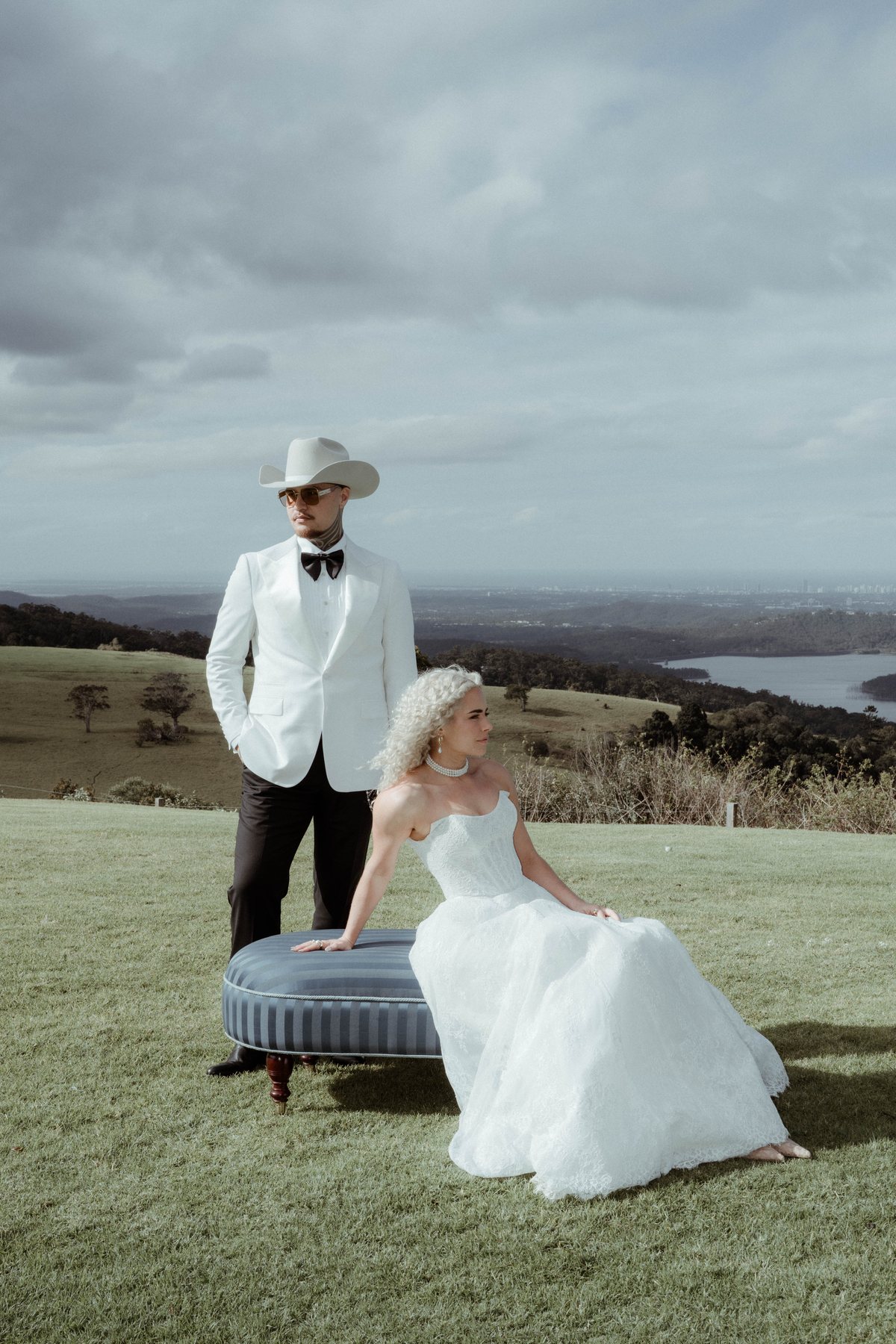 Kaleb and Monique on the lawn above the valley at Rosewood Estate, Beechmont QLD — wedding photography by C2 Films