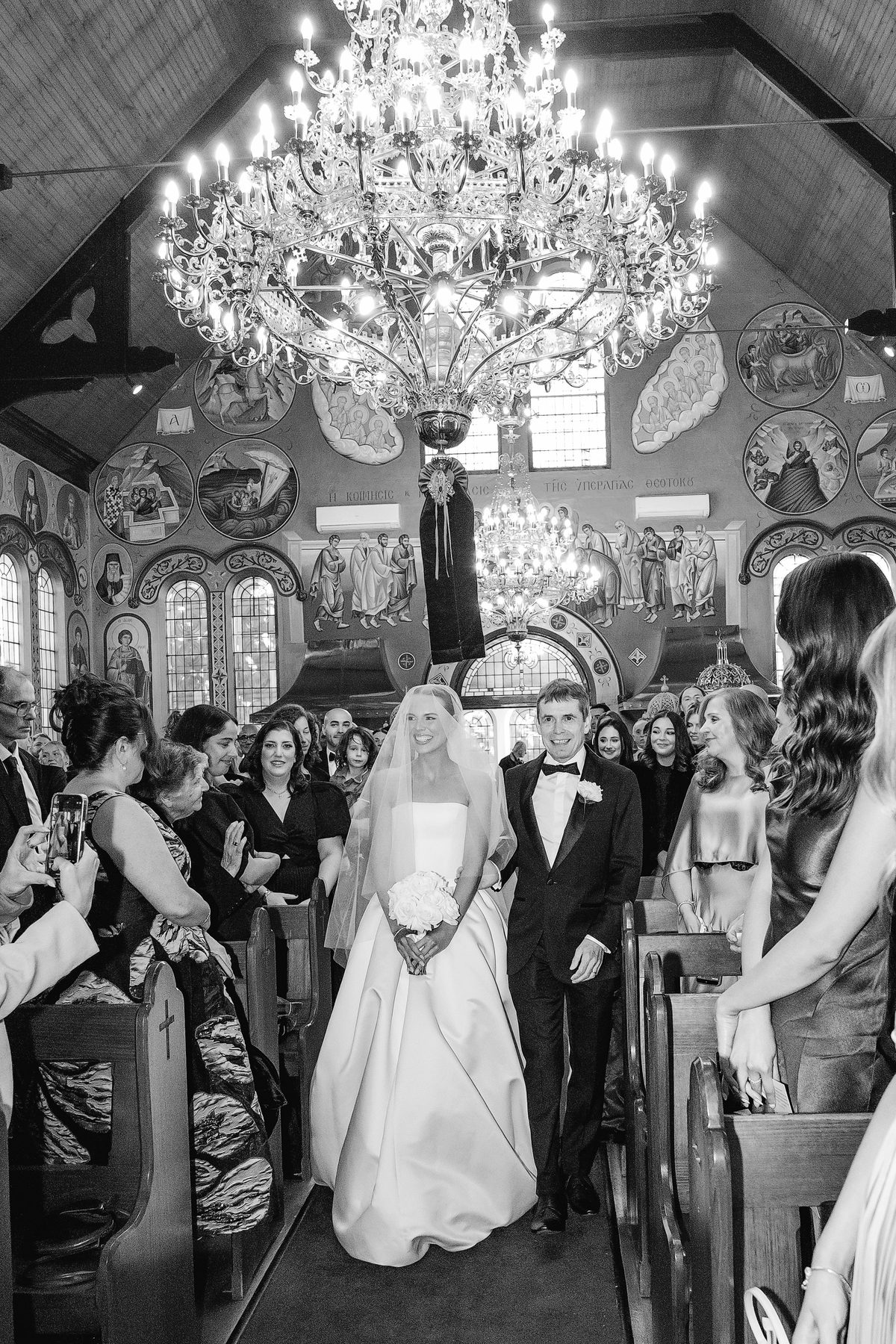 Simon and Sara exchanging vows at St Eustathios Greek Orthodox Church — C2 Films wedding photography