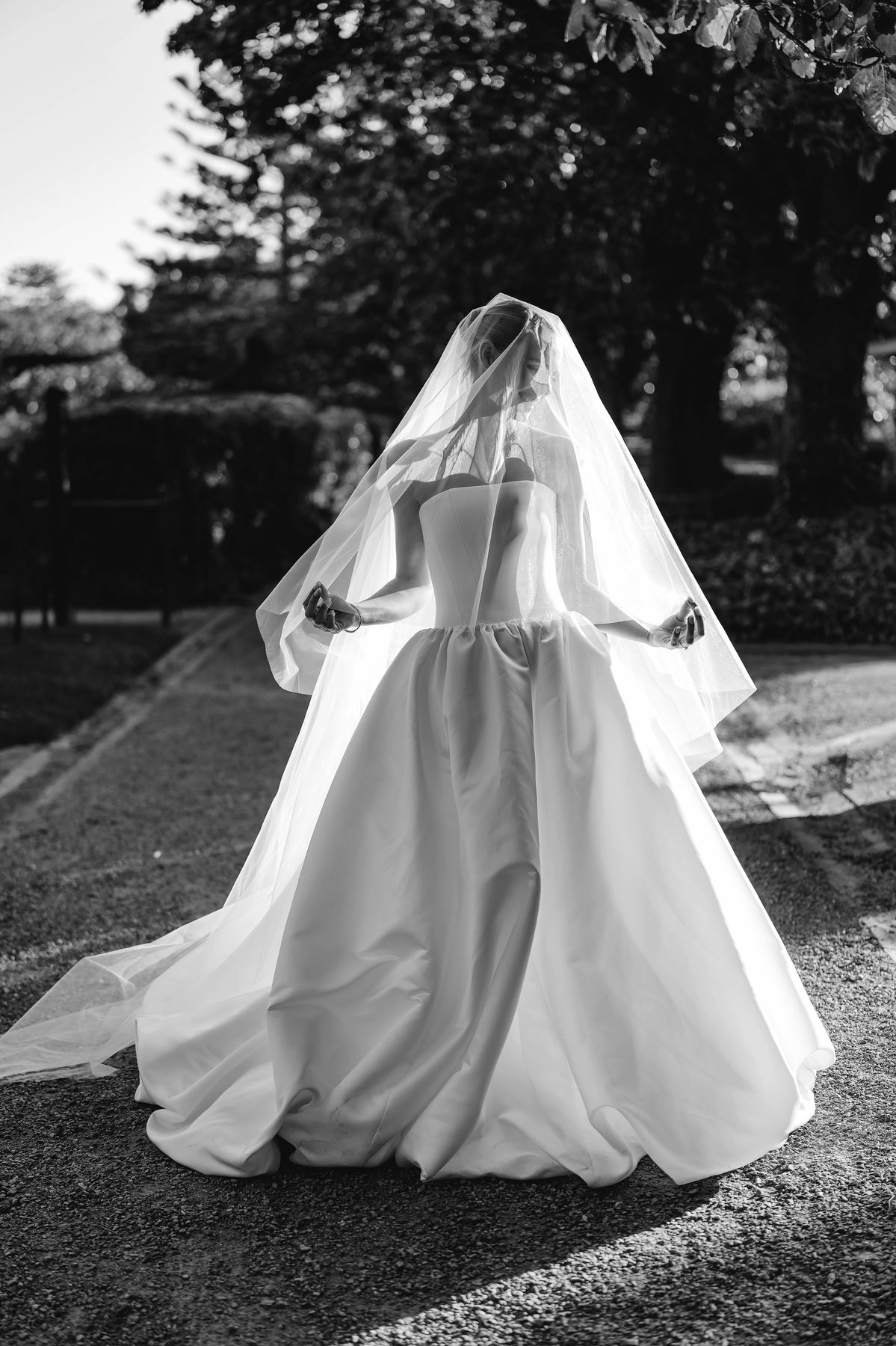 Simon and Sara — portrait session after the ceremony on their wedding day at Carousel, Albert Park, by C2 Films
