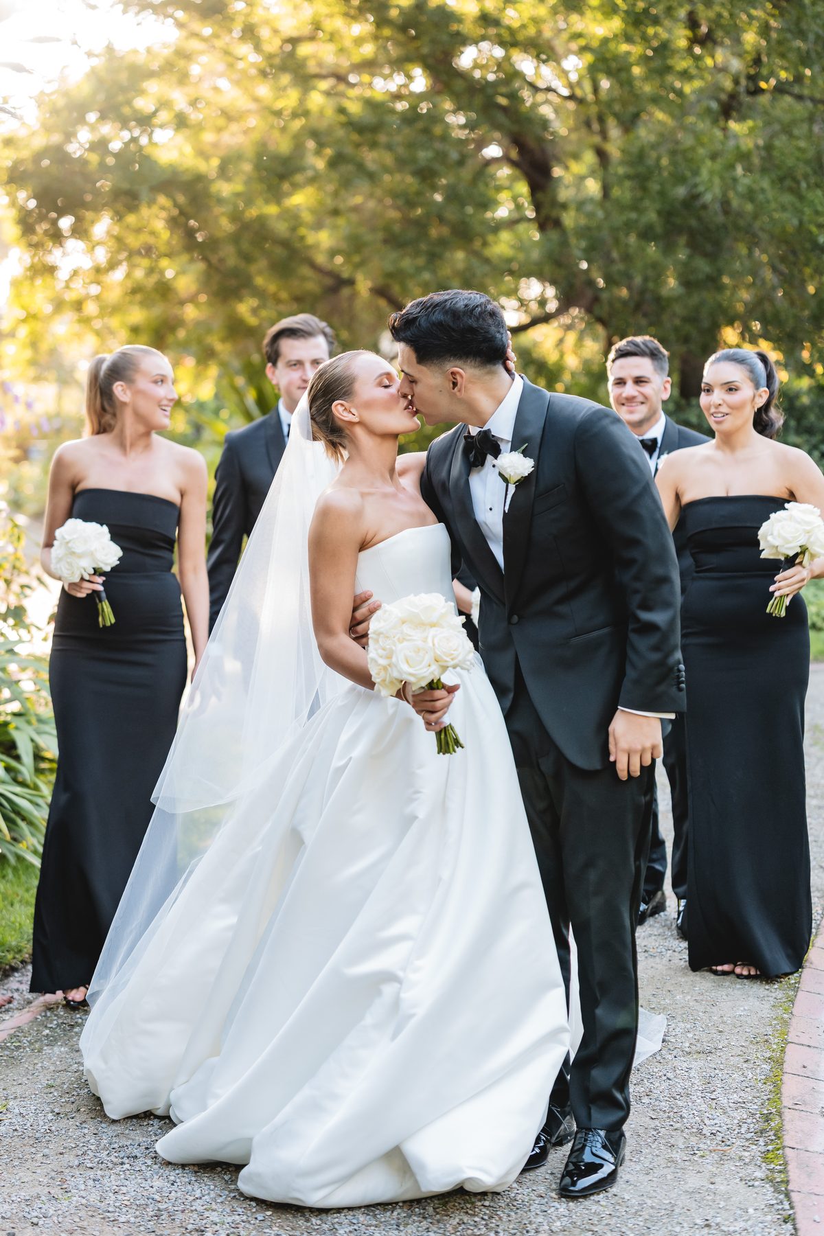 Simon and Sara — bridal party portraits on their wedding day at Carousel, Albert Park, by C2 Films