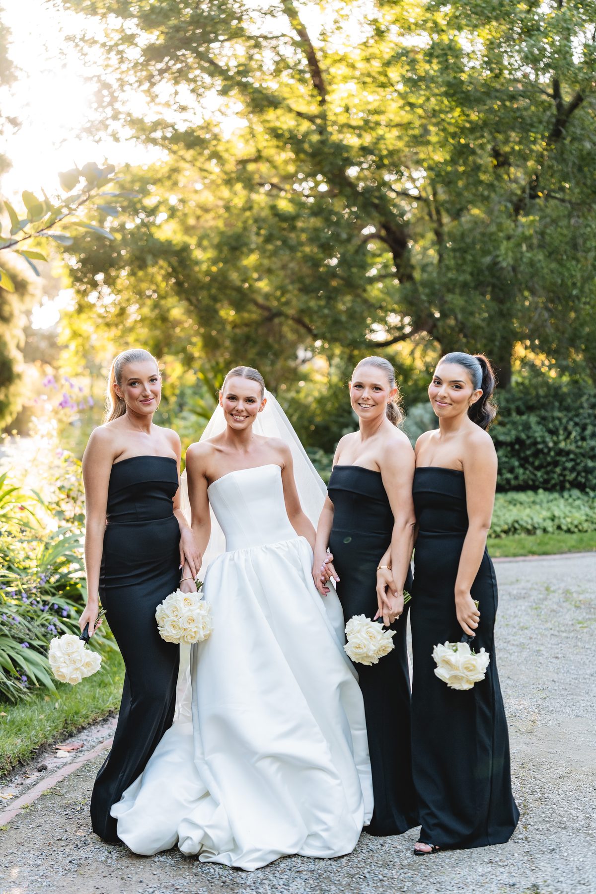 Simon and Sara — portraits on the wedding day on their wedding day at Carousel, Albert Park, by C2 Films
