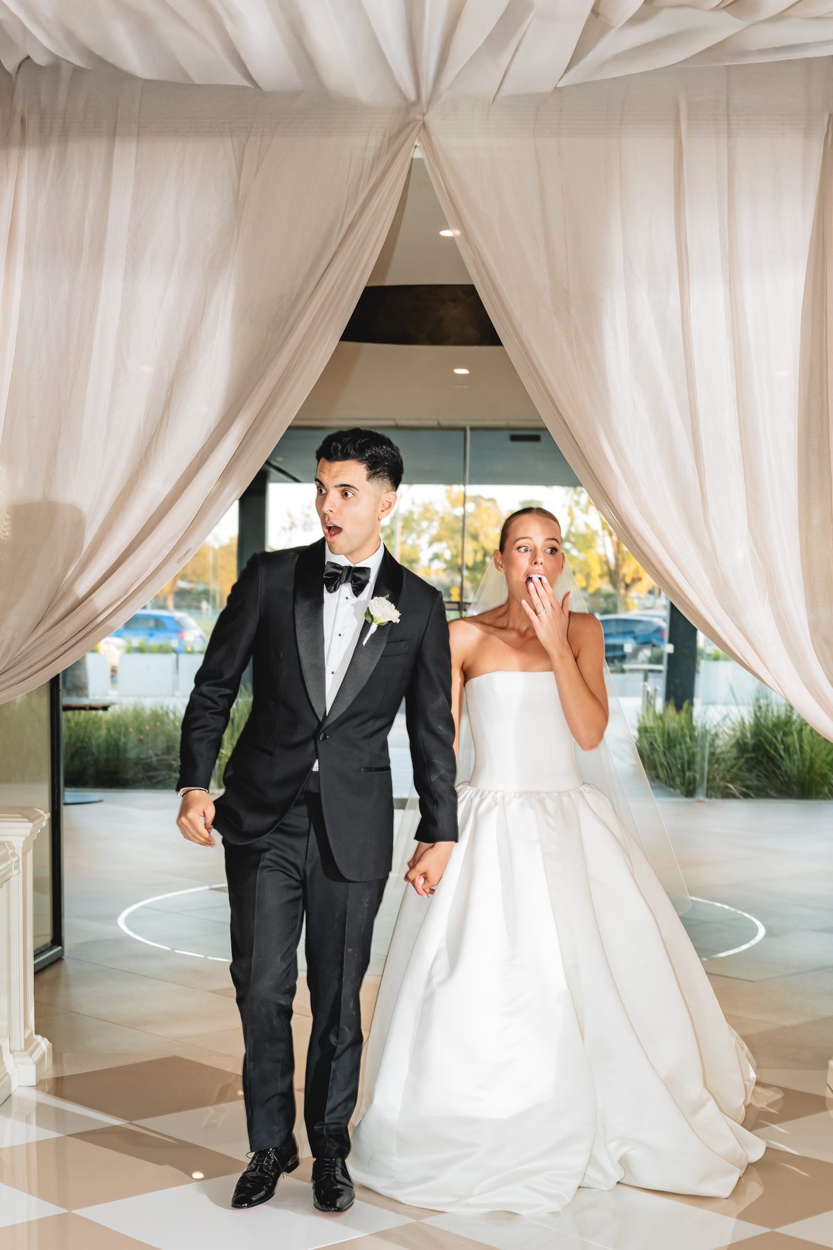 Simon and Sara — celebrating at the reception at Carousel, Albert Park, Melbourne wedding photography by C2 Films