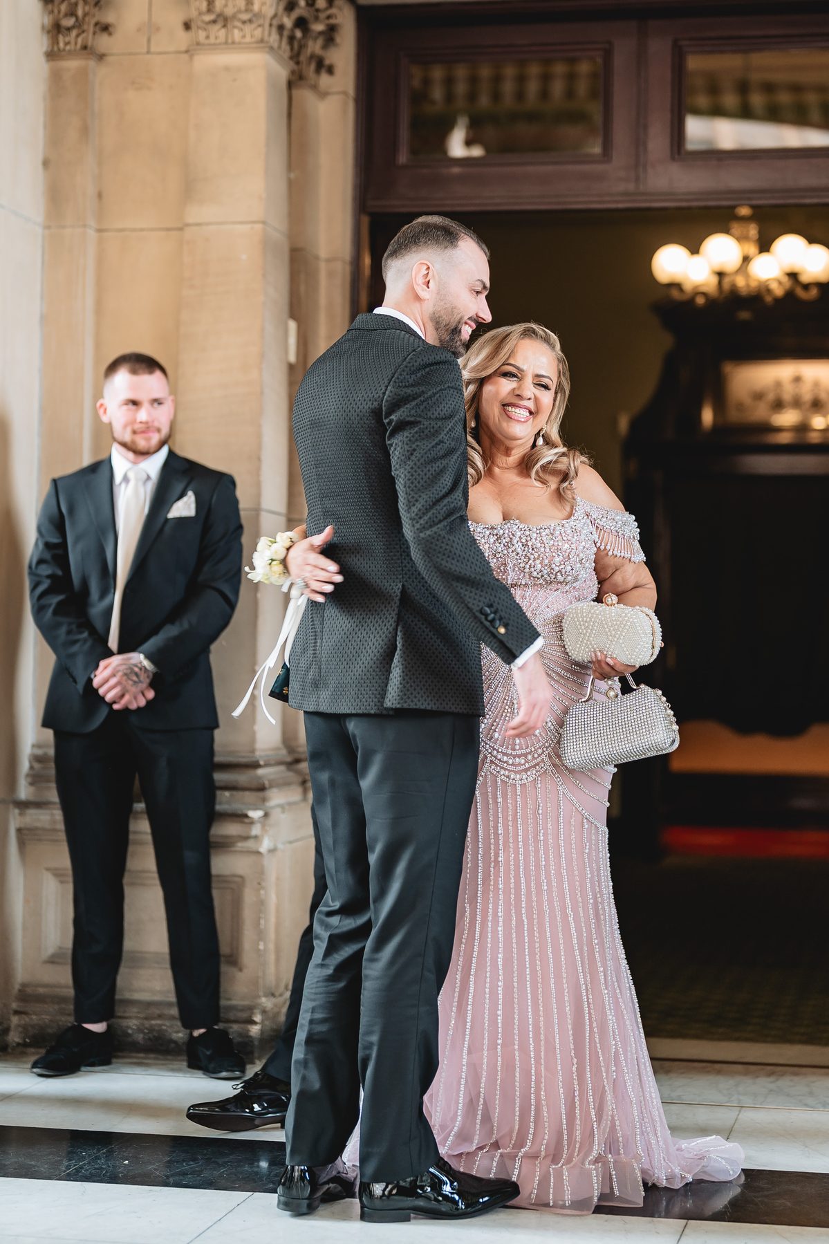 Toni and Suzie walking down the aisle at Melbourne Town Hall — C2 Films wedding photography