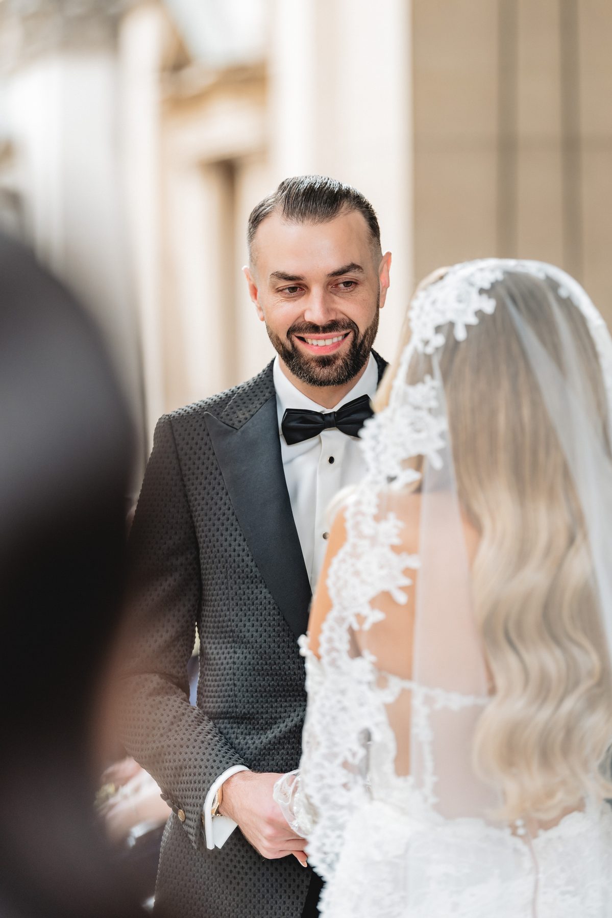 Toni and Suzie during the ceremony at Melbourne Town Hall — C2 Films wedding photography