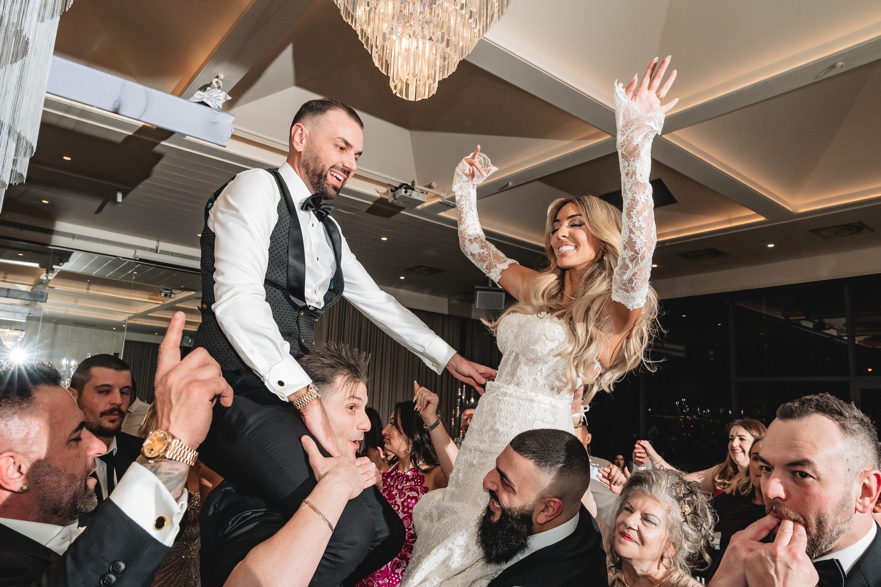 Toni and Suzie — celebrating at the reception at Leonda by the Yarra, Melbourne wedding photography by C2 Films